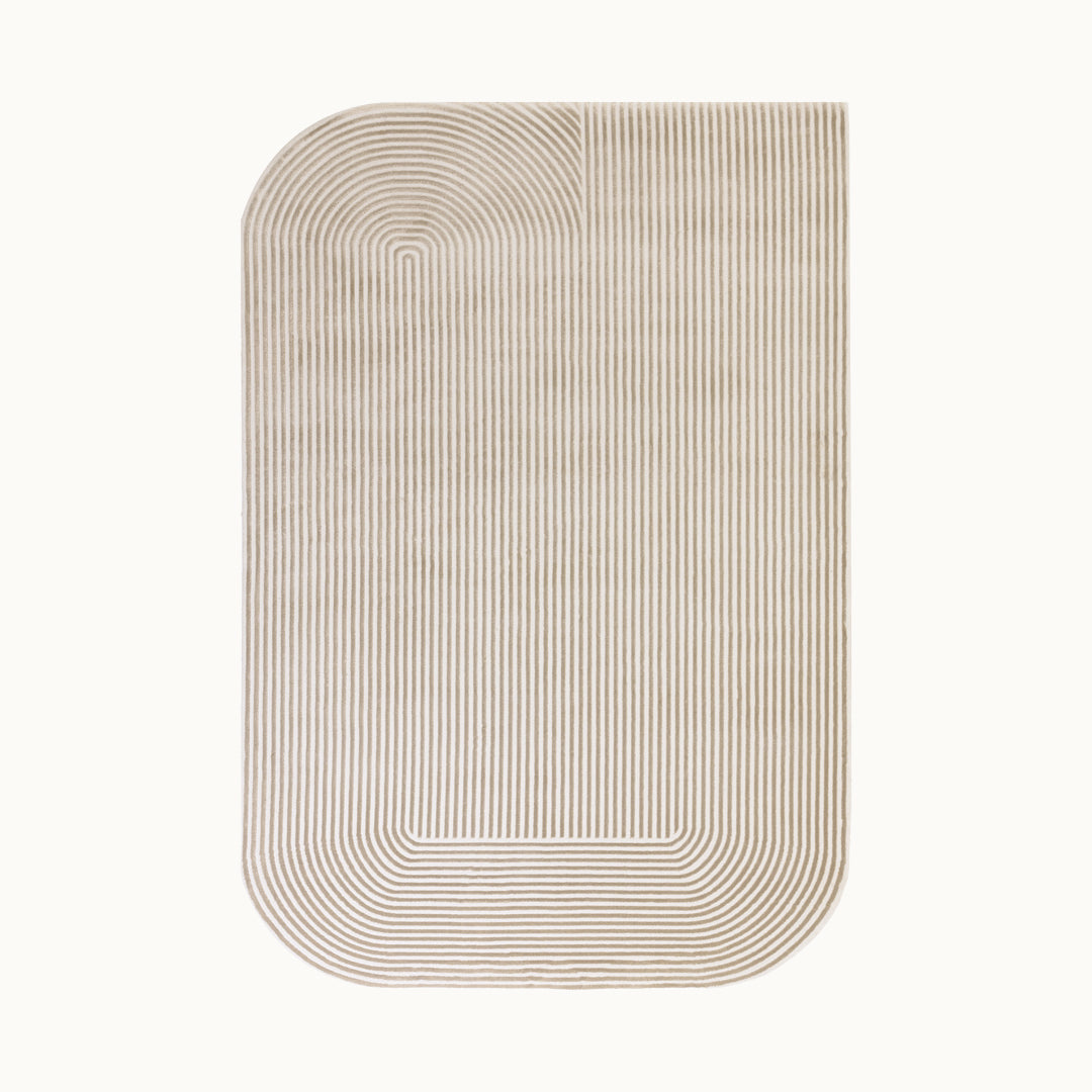 160x230cmサイズのモダンなシェイプのミニマルデザインとゴールド × アイボリーのリブ模様が魅力的なベルベット調RUGHAUSのポリプロピレン・ポリエステル製アートラグ