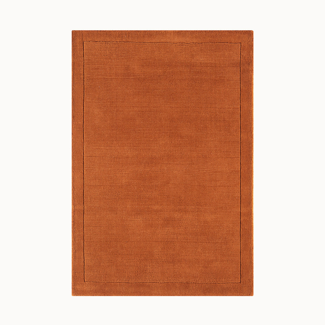 160x230cmサイズの、明るく温かな印象の暖色が心地よいアーシーカラー、テラコッタ(赤茶色)色の、サステナブルな天然素材ウール(羊毛)100%製RUGHAUSのふんわりシンプル手織りラグ