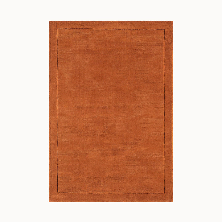 160x230cmサイズの、明るく温かな印象の暖色が心地よいアーシーカラー、テラコッタ(赤茶色)色の、サステナブルな天然素材ウール(羊毛)100%製RUGHAUSのふんわりシンプル手織りラグ