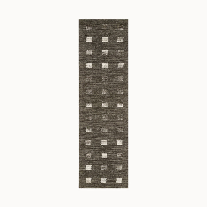 70x245cmサイズのニュートラルなチャコールグレー×アイボリー色と手織りの温もり感が見事にマッチした、シンプルだけど、ほっこりする、RUGHAUSの天然素材ウール100％製ハンドタフテッドラグランナー