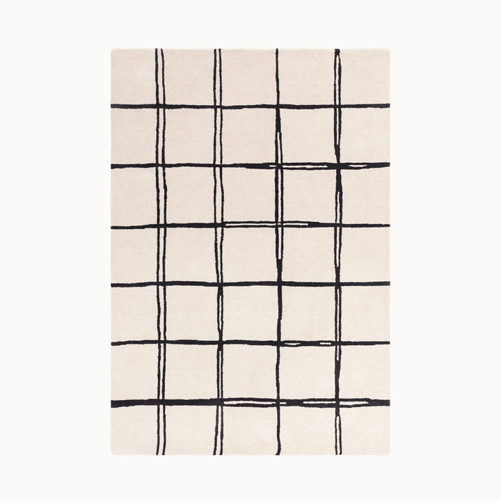 160x230cmサイズの、ホワイト×ブラック色のラフに描かれた格子パターンが可愛らしい、シンプルながらもセンスがきらりと光る、天然素材ウール100％製RUGHAUSのハンドタフトラグ Ane