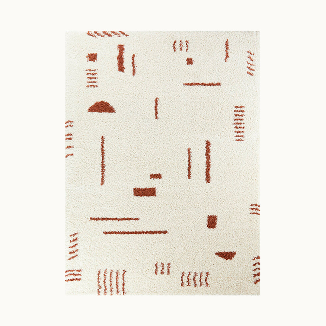 130x185cmサイズのふわふわとした手触りと厚み、アイボリー×テラコッタ色の素朴でアーティスティックなパターンが魅力的なコンテンポラリーモダンラグ