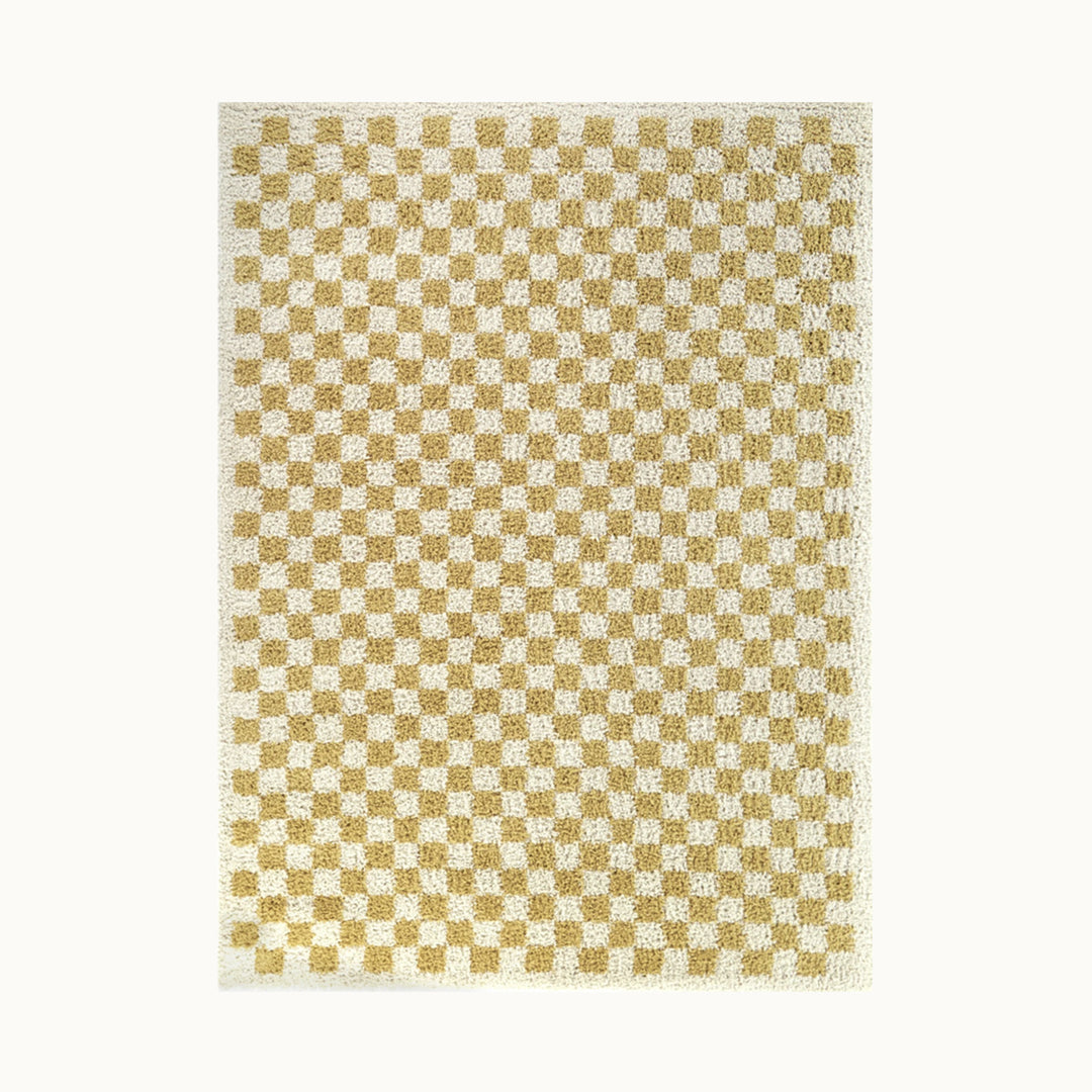 160x215cmサイズのオシャレなマスタード色のチェッカー柄とふんわりシャギー感がかわいいコンテンポラリーアートラグ