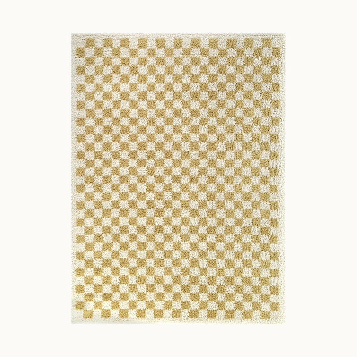 160x215cmサイズのオシャレなマスタード色のチェッカー柄とふんわりシャギー感がかわいいコンテンポラリーアートラグ