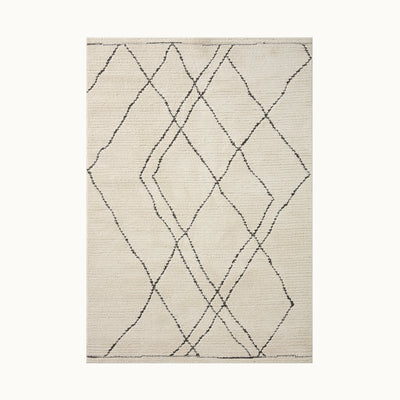 160x230cmサイズのしっかりとした平織りのアイボリー地に描かれた自由奔放なベニワレンパターンが魅力的なシンプルモロッカンラグ