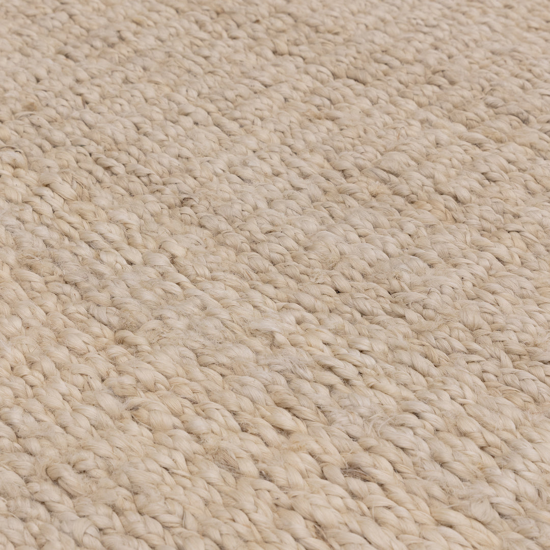 サンドベージュの色合いとざっくりとしたナチュラルな風合いが素敵なRUGHAUSの手織りリバーシブル天然エコ素材ジュート製ラグの素材感がわかるクロースアップ