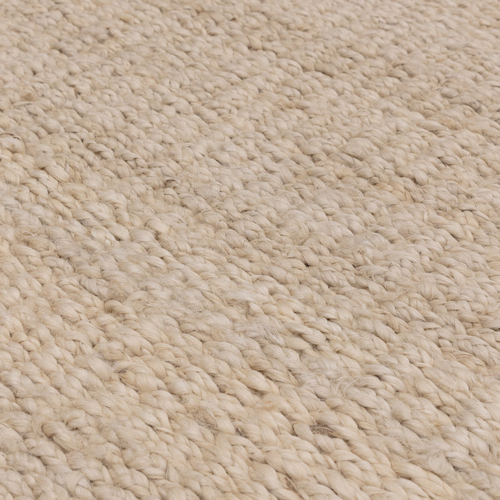 サンドベージュの色合いとざっくりとしたナチュラルな風合いが素敵なRUGHAUSの手織りリバーシブル天然エコ素材ジュート製ラグの素材感がわかるクロースアップ