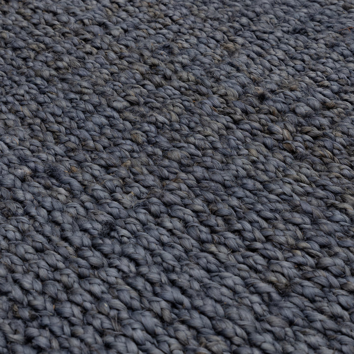 デニムのようなネイビーの色合いとざっくりとしたナチュラルな風合いが素敵なRUGHAUSの手織りリバーシブル天然エコ素材ジュート製ラグの素材感がわかるクロースアップ