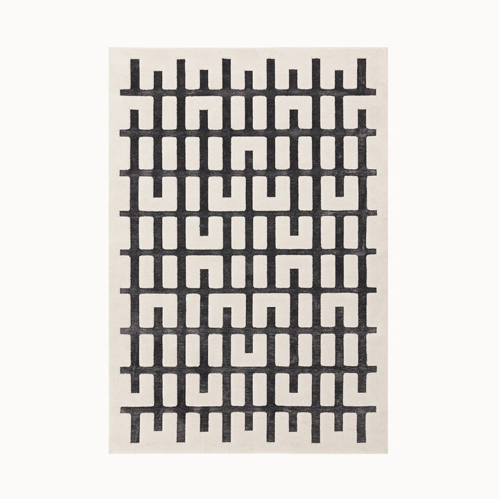 160x230cmサイズのベルベットのような手触りのふわふわの3Dパターン × 北欧デザインを組み合わせた、チャコールとアイボリーの配色が素敵な、お手入れ楽ちんポリエステル製RUGHAUSの北欧モダンデザインラグ